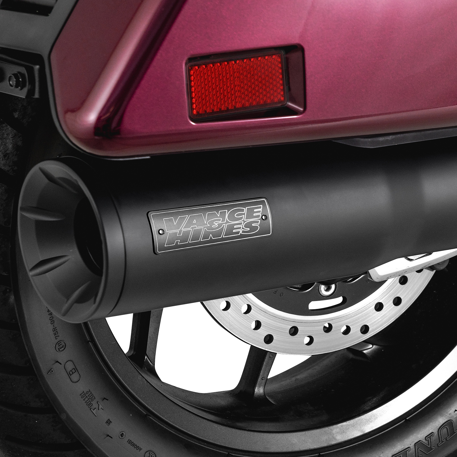VANCE & HINES Hi-Output Slip-On Muffler in matte black with CNC aluminum finish for motorcycle exhaust upgrade.