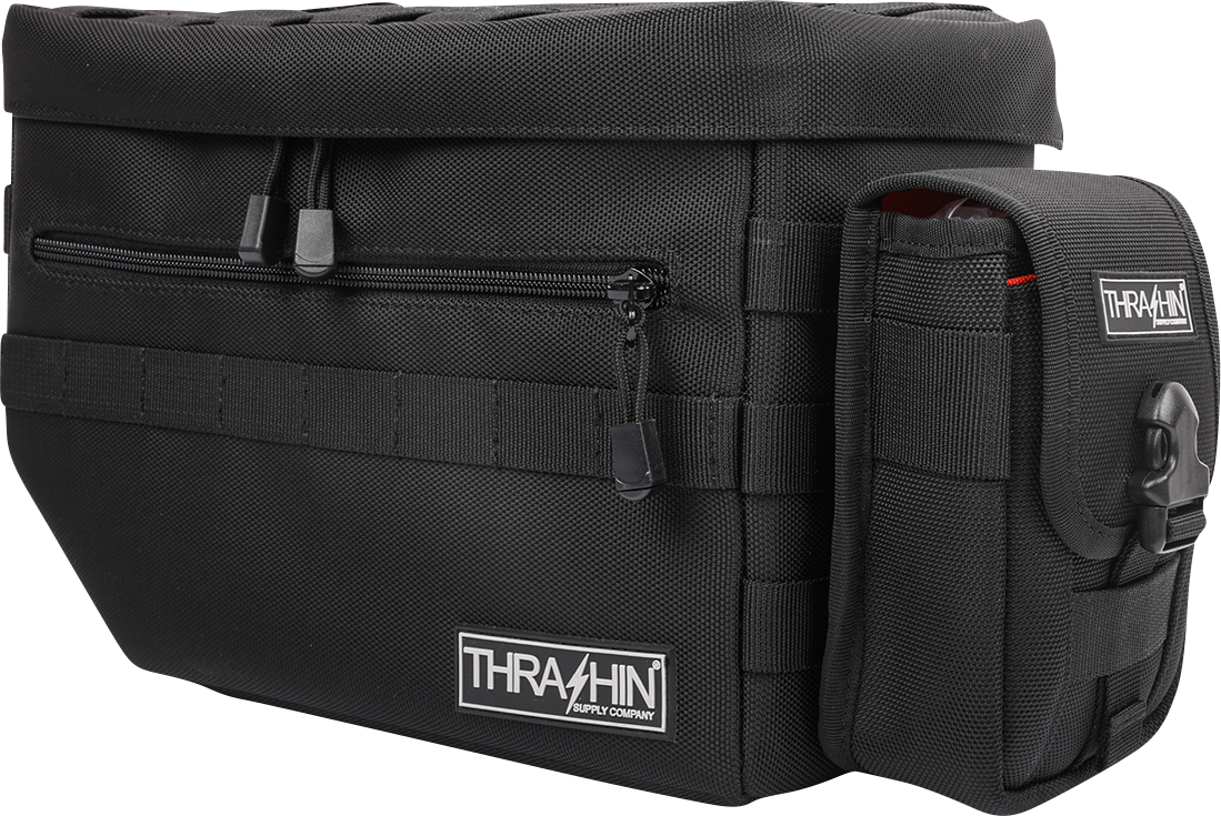 Durable THRASHIN SUPPLY CO. multi-use pouch made of 1680D ballistic nylon with a high visibility interior for easy access.
