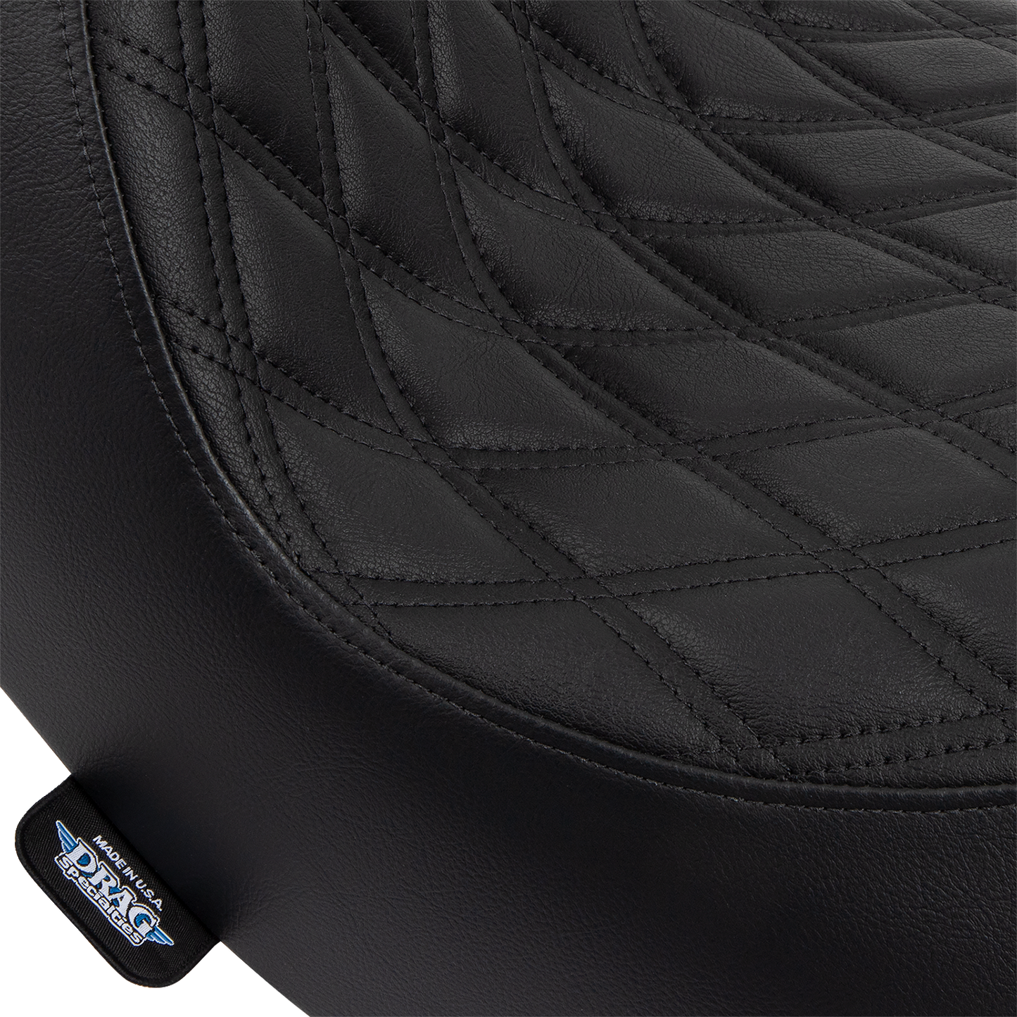 Black double diamond solo seat for FL/FX motorcycles by Drag Specialties with black stitching, model 0802-1513.
