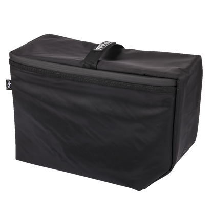 Black THRASHIN SUPPLY CO. Cooler Expedition Bag TSB-0012 with sturdy handles and zipper closure, designed for outdoor cooling needs.