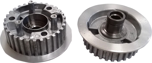 DRAG SPECIALTIES clutch hub for touring and trike models, showing the metal component with detailed machining and mounting points.