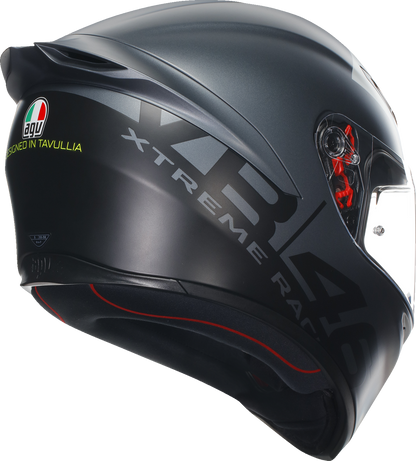 AGV K1 S motorcycle helmet in size large, sleek black with matte finish, featuring aerodynamic design and ventilation vents.