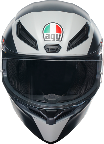 AGV K1 S helmet in size large, black with red accents, featuring aerodynamic design and ventilation vents for motorcycle riding.