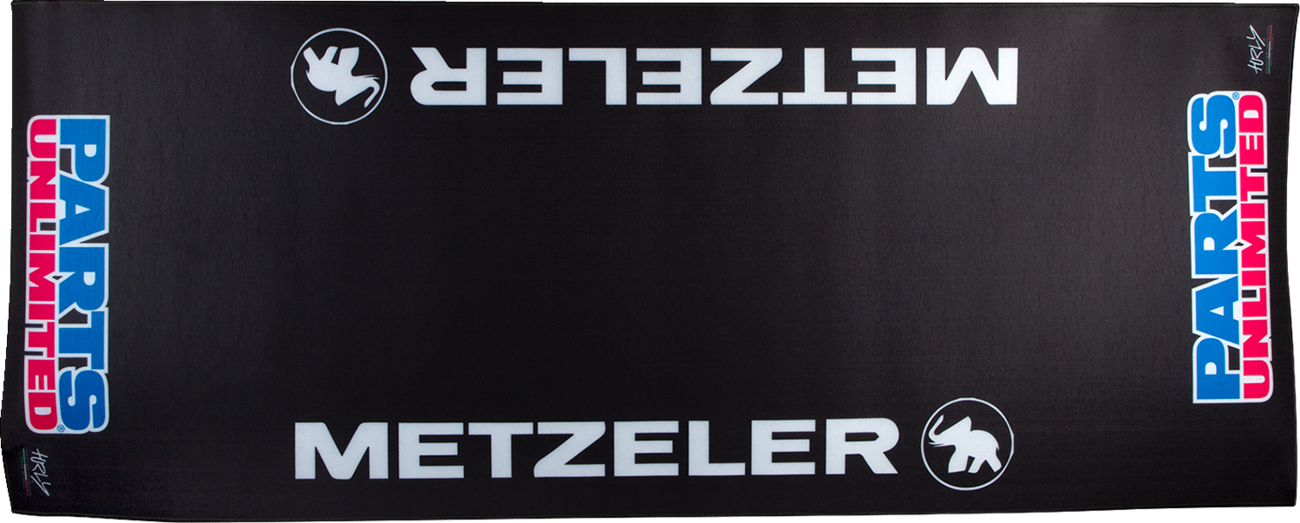 Large PARTS UNLIMITED absorbent pit pad with logo, used for shop and pit area protection, featuring durable, high-absorbency material.
