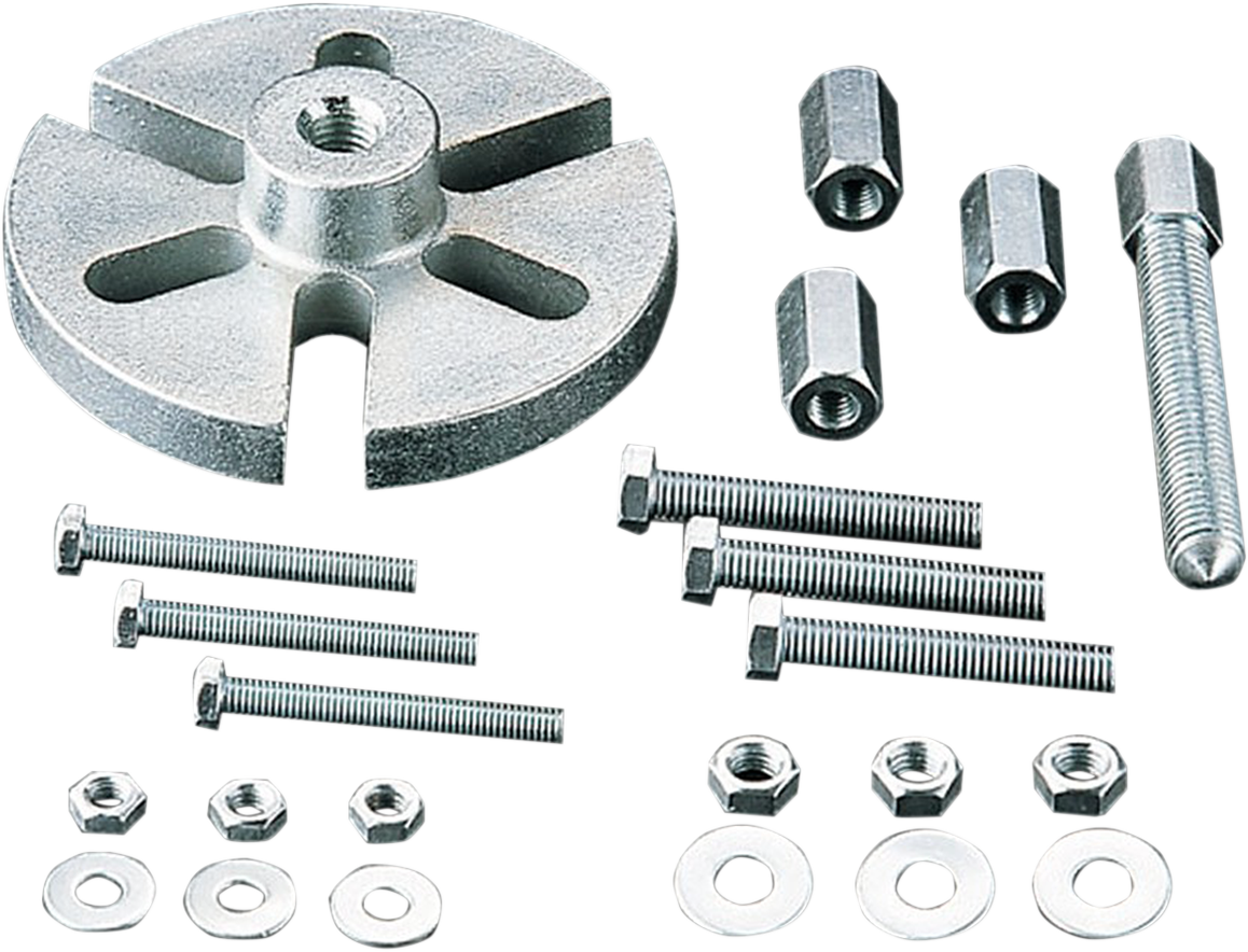 Parts Unlimited Flywheel Puller 855 for motorcycle, ATV, watercraft, and snowmobile engines, shown in use on engine component.