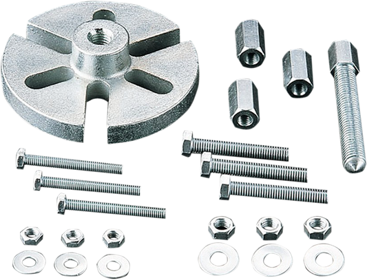 Parts Unlimited Flywheel Puller 855 for motorcycle, ATV, watercraft, and snowmobile engines, shown in use on engine component.