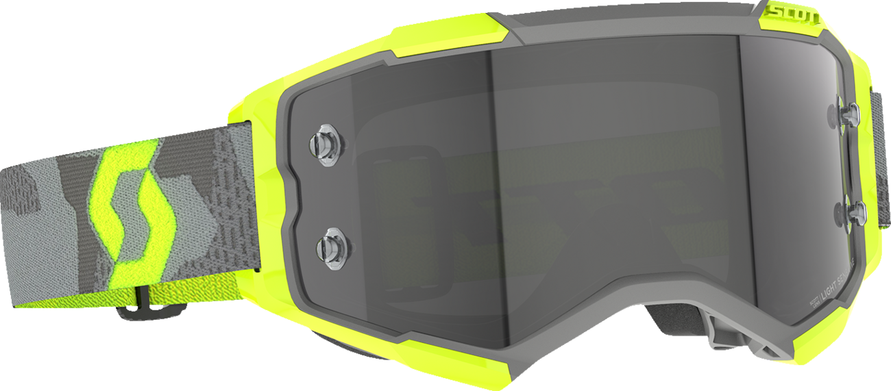 Scott Fury Goggle in light gray and neon yellow with light-sensitive gray lens, designed for motocross or off-road riding.