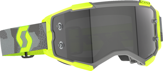 Scott Fury Goggle in light gray and neon yellow with light-sensitive gray lens, designed for motocross or off-road riding.