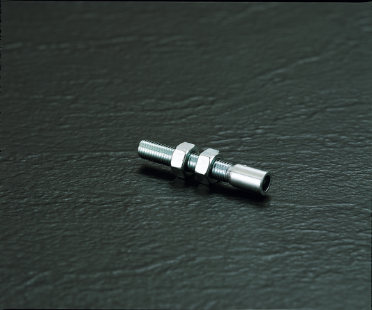 PARTS UNLIMITED Cable Adjuster 935 for 3/16 inch cable housing, shown on a bicycle cable system for gear or brake adjustment.