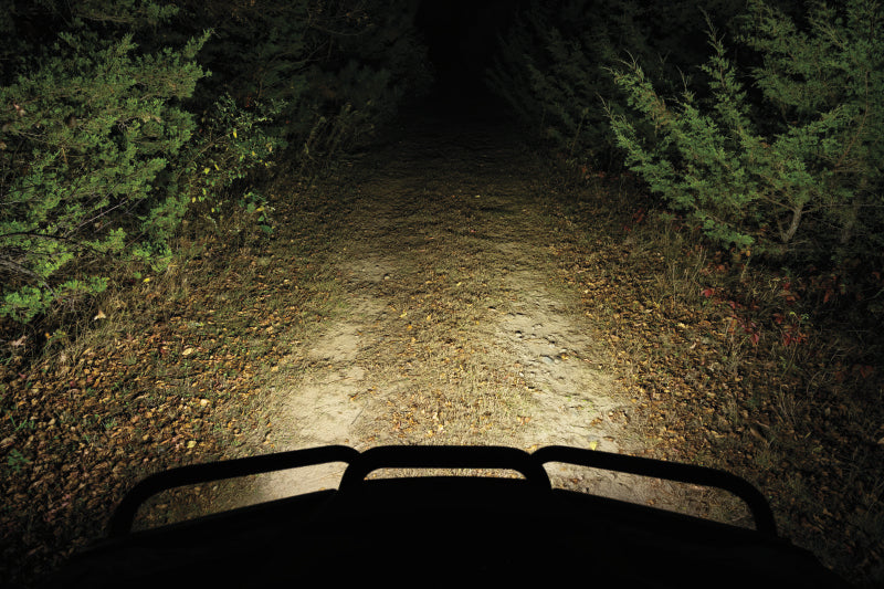 Kuryakyn Lodestar 750L flood beam high-output driving lights mounted on a powersports vehicle for enhanced visibility.
