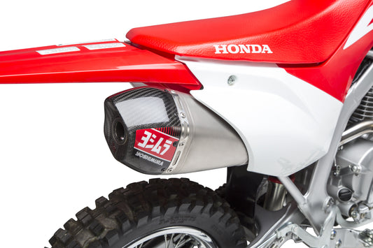 YOSHIMURA RS-9T exhaust system with stainless steel, aluminum, and carbon fiber components, mounted on a motorcycle.