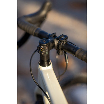 Bill's Exhausts SP CONNECT universal device mount showing secure attachment point for smartphones and accessories.