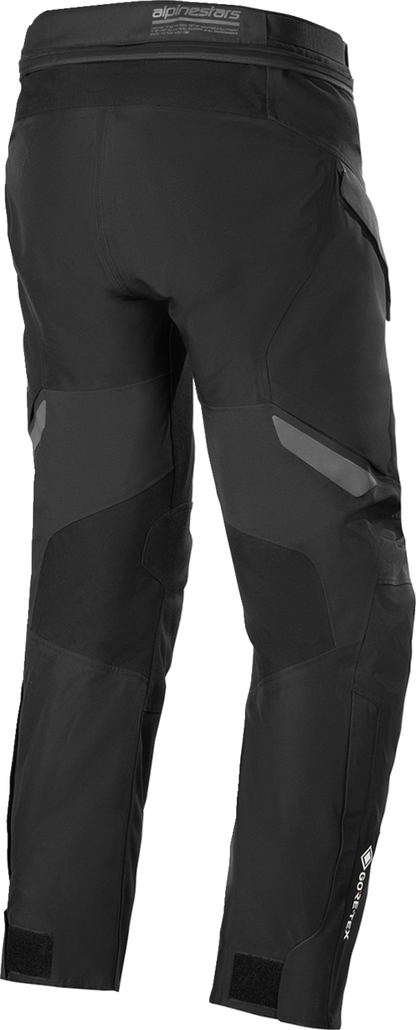 Alpinestars ST-7 2L Gore-Tex black motorcycle riding pants in small size, showing durable waterproof fabric and reinforced details.