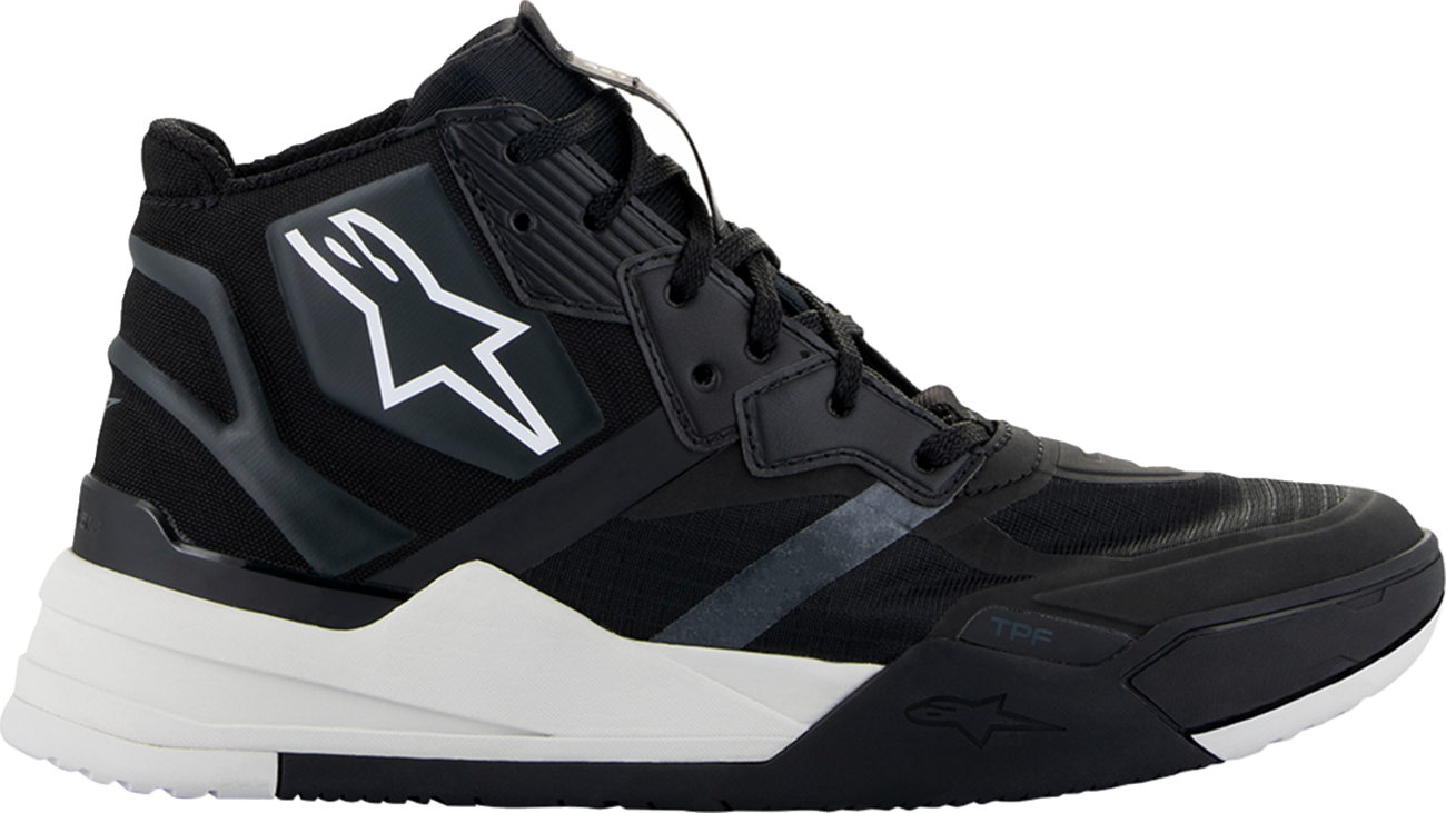 Alpinestars Speedflight performance riding shoe in black and white, US size 14, close-up view showing sleek design and protective features.