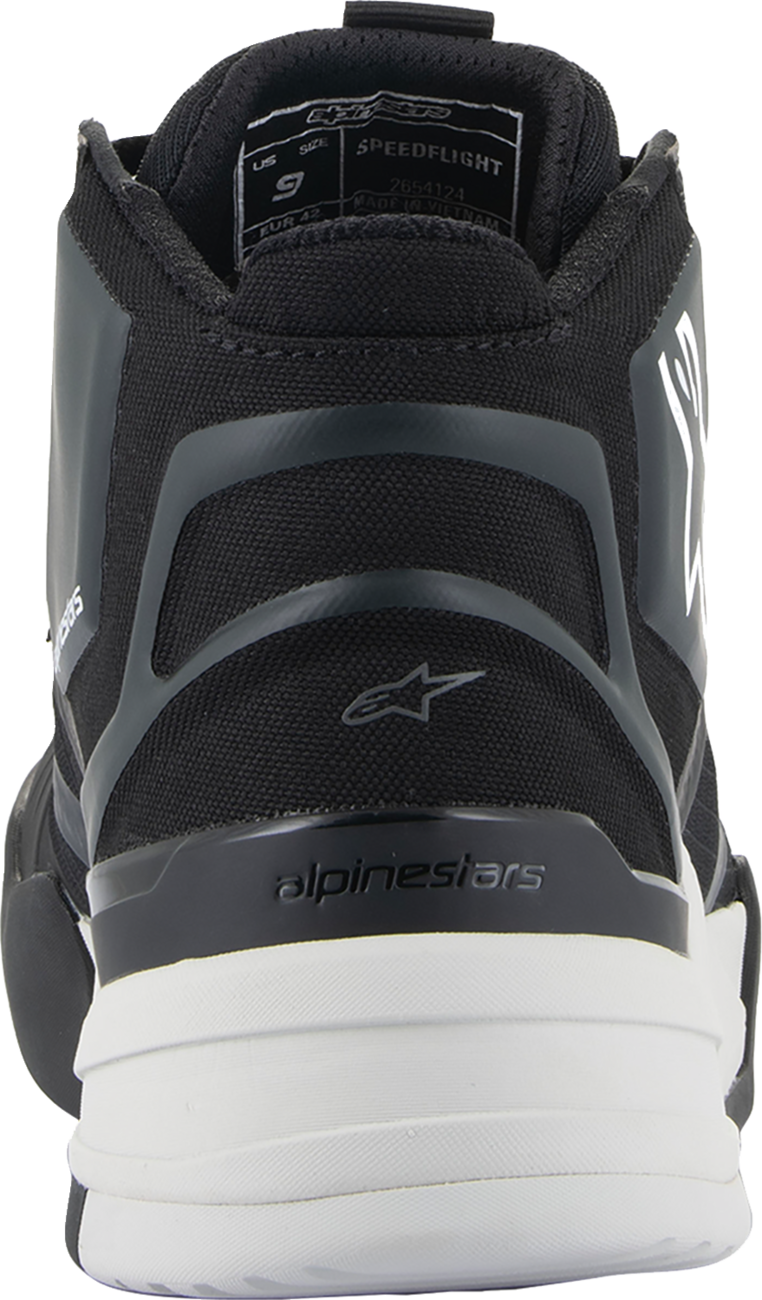 Alpinestars Speedflight performance riding shoe in black and white, US size 11, showing sleek design and durable materials.