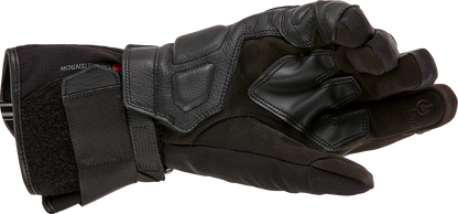 Alpinestars W-7 V2 Drystar winter motorcycle gloves in black, size XL, showing padded knuckles and textured grip palms.