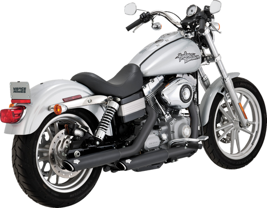 VANCE & HINES 3-inch twin slash slip-on muffler installed on a Harley-Davidson motorcycle, showcasing chrome finish and sleek design.