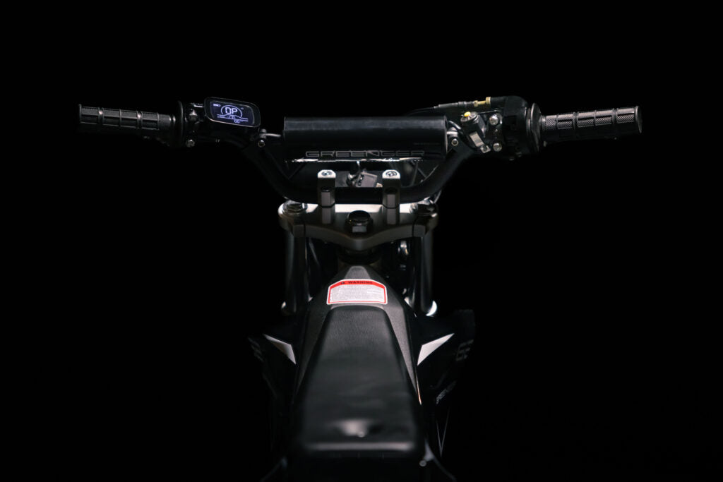 Greenger G2 electric dirt bike for kids, 50cc equivalent, with rugged tires and compact frame for young riders.