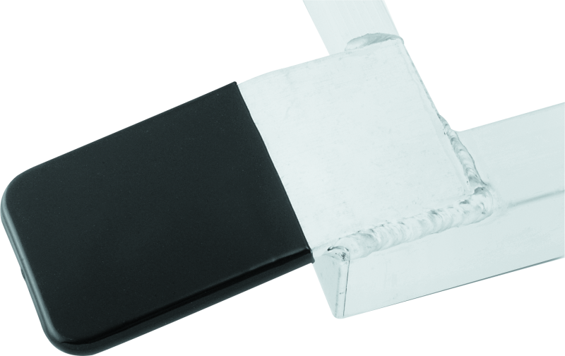 QuadBoss Quadlite Ramp Vinyl Tip, a durable and lightweight accessory for powersports ramps, shown attached to the ramp.