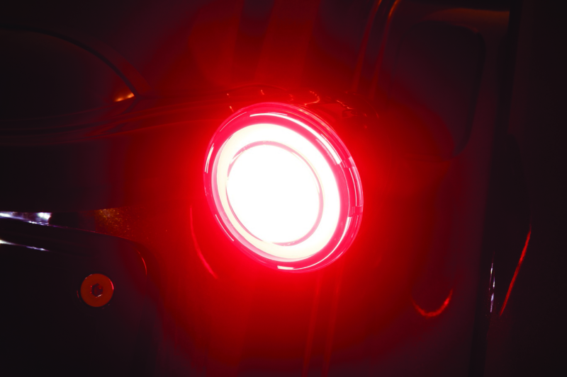 Kuryakyn Tracer LED Rear Turn Signal Insert for Harley Davidson Road King Special showing the clear lens and LED lighting elements.