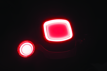 Kuryakyn Tracer LED Rear Turn Signal Conversion Kit for Harley Davidson motorcycles, showing the LED turn signal components.