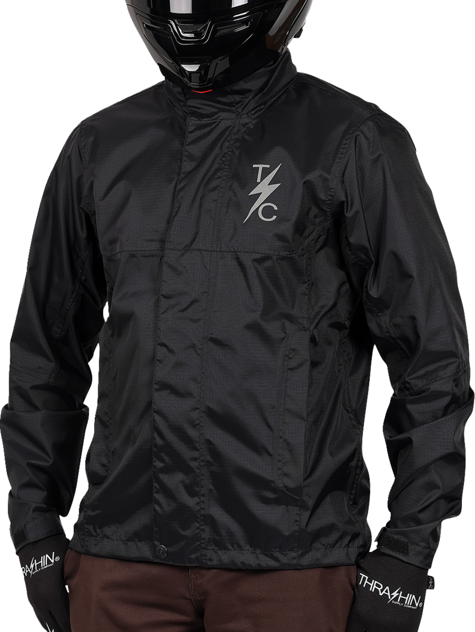Black THRASHIN SUPPLY CO. Mission WP rain jacket in medium size, waterproof and lightweight for outdoor protection.