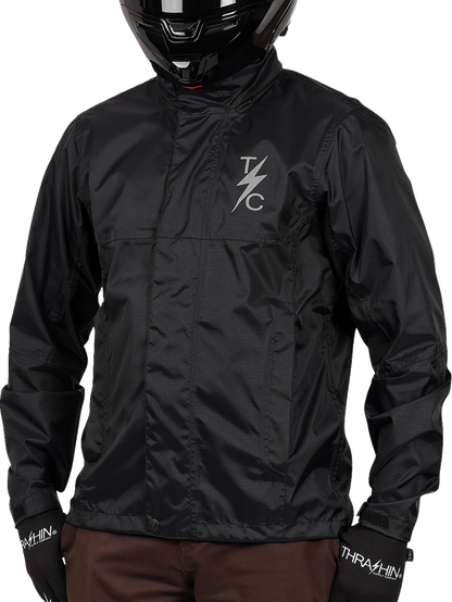 Black THRASHIN SUPPLY CO. Mission WP rain jacket in medium size, waterproof and lightweight for outdoor protection.