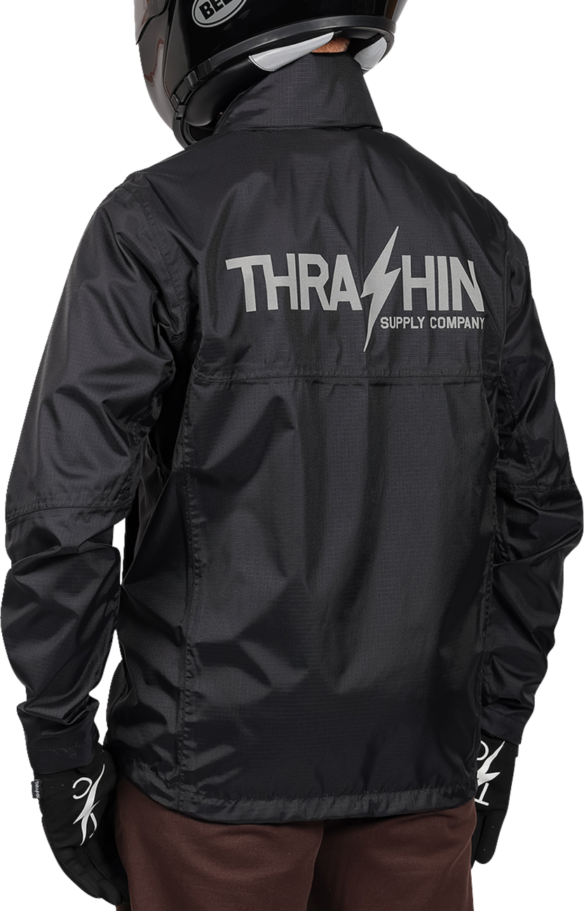 Black THRASHIN SUPPLY CO. Mission WP Rain Jacket in medium size, showcasing waterproof design and durable fabric.