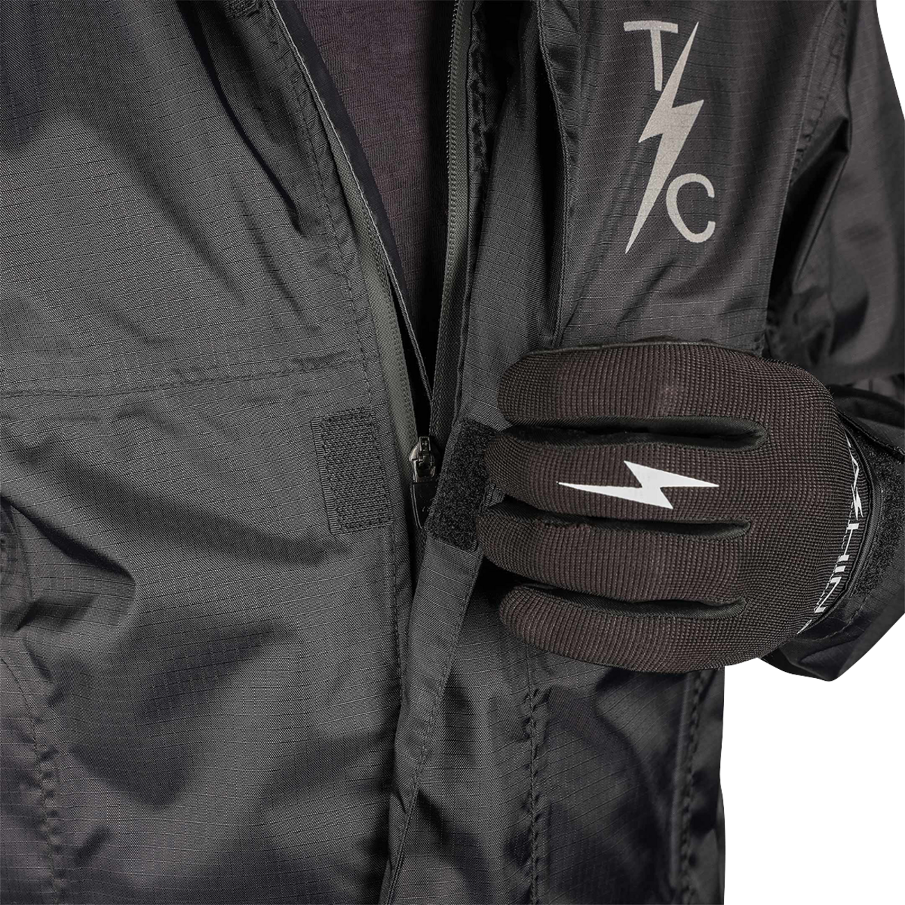 Black THRASHIN SUPPLY CO. Mission WP Rain Jacket in Medium, waterproof outdoor jacket with hood and lightweight design.