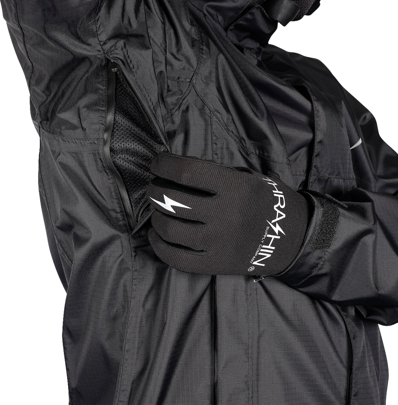 Black THRASHIN SUPPLY CO. Mission WP rain jacket in medium size, featuring waterproof material and a sleek design.