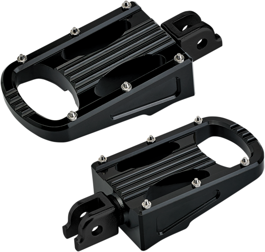 Black BILTWELL Punisher footpeg for Softail motorcycles, designed by Bill's Exhausts, shown mounted on a bike.