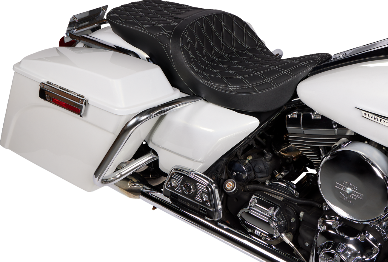 Drag Specialties Freedom Seat for Harley FLH 1997-2007 with vinyl cover and double diamond silver stitching, shown from a side view