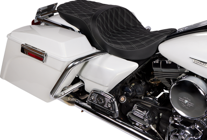 Drag Specialties Freedom Seat for Harley FLH 1997-2007 with vinyl cover and double diamond silver stitching, shown from a side view
