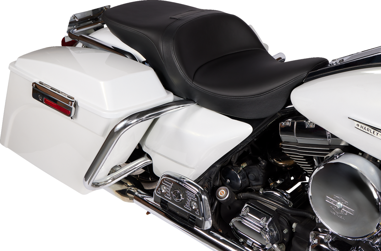 Black solar leather Drag Specialties Freedom Seat for Harley FLH 1997-2007, designed for comfort and style.