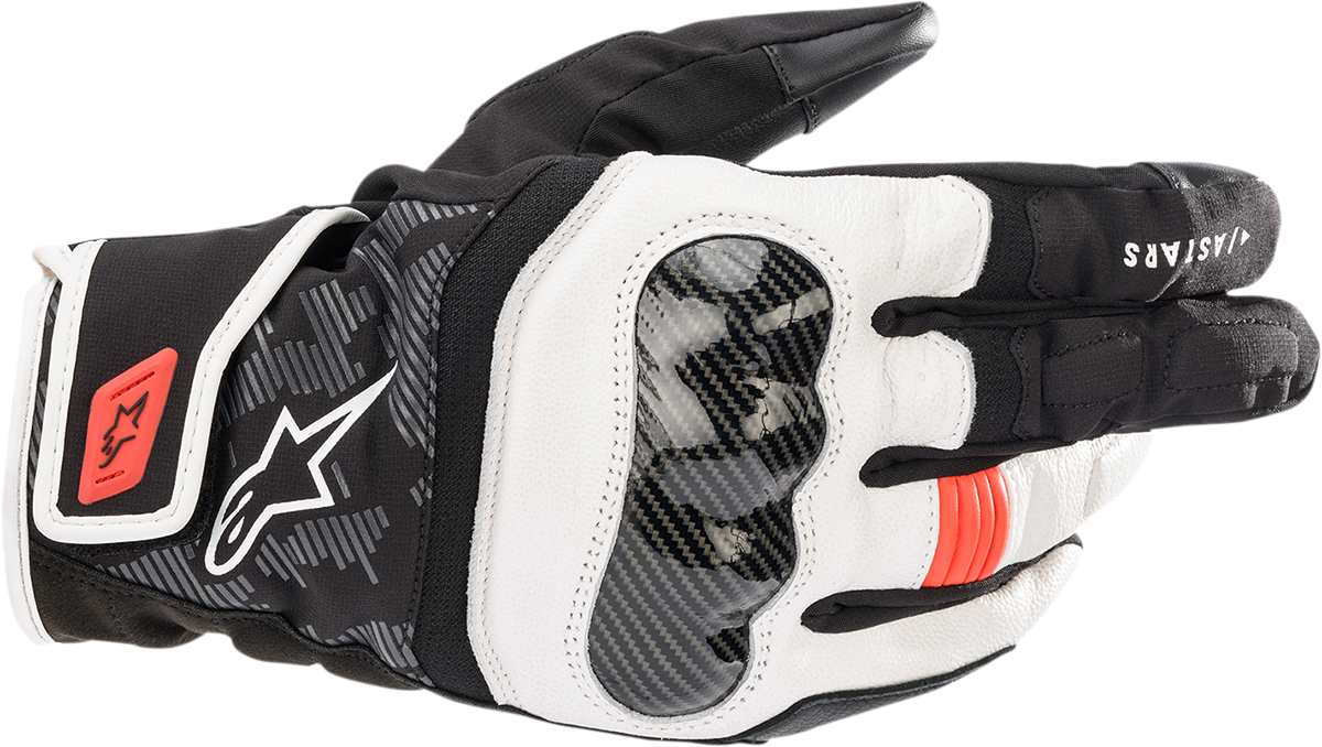 Alpinestars SMX Z Drystar gloves in black, white, and fluo red with protective knuckles and adjustable wrist strap.