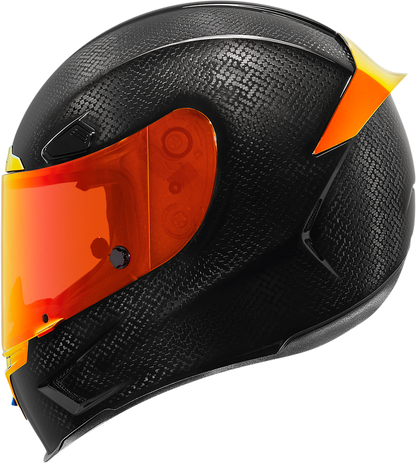 Red ICON Airframe Pro™ Helmet in carbon fiber with XS size, featuring aerodynamic design and ventilation for motorcycle riders.