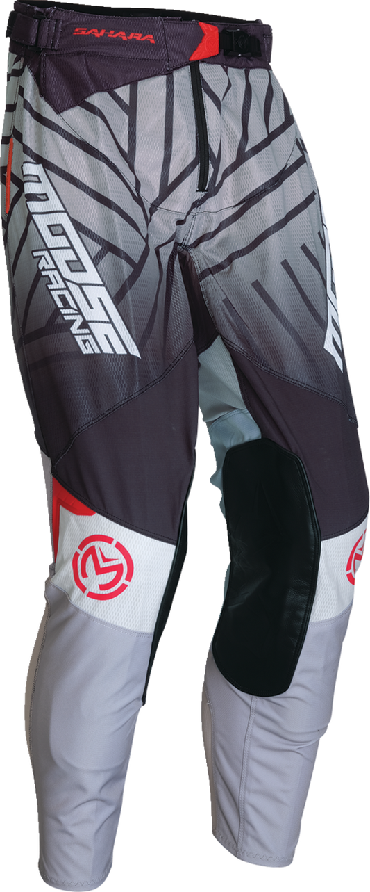 Black and white MOOSE OFFROAD Sahara riding pants with reinforced knees and ventilated mesh for offroad motorcycle riding.