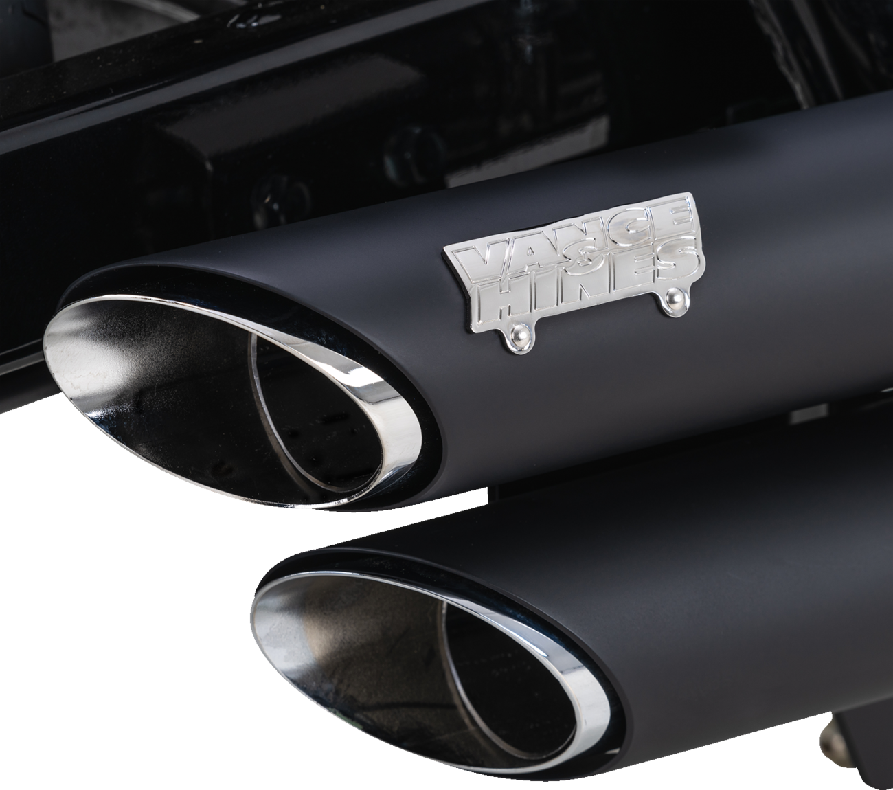 VANCE & HINES Shortshots Staggered Exhaust System in black for motorcycle, showing the sleek, staggered dual pipe design.