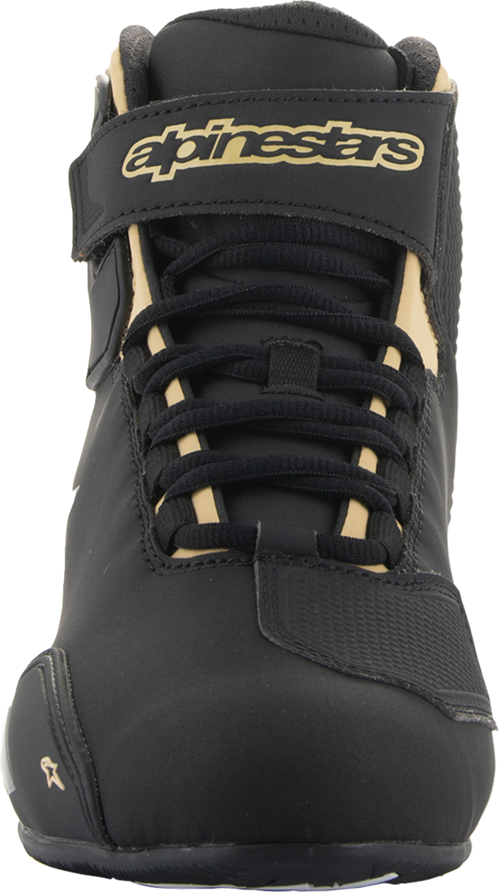 Black and champagne Alpinestars Stella Sektor women's motorcycle shoes in US 8.5 / EU 40.5, with protective design and sporty look.