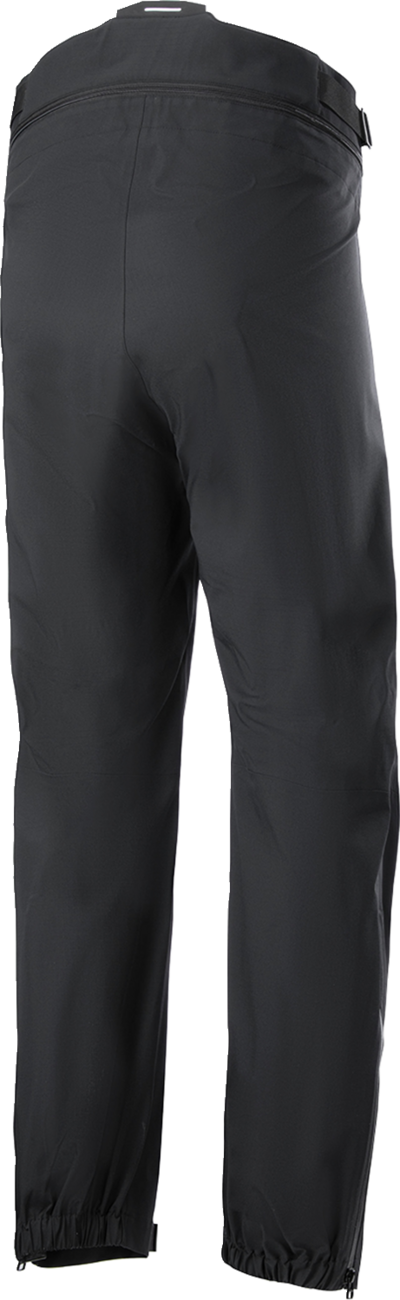 Alpinestars AMT Storm Gear Drystar XF waterproof motorcycle riding pants in medium, featuring reinforced knee areas and adjustable waist.