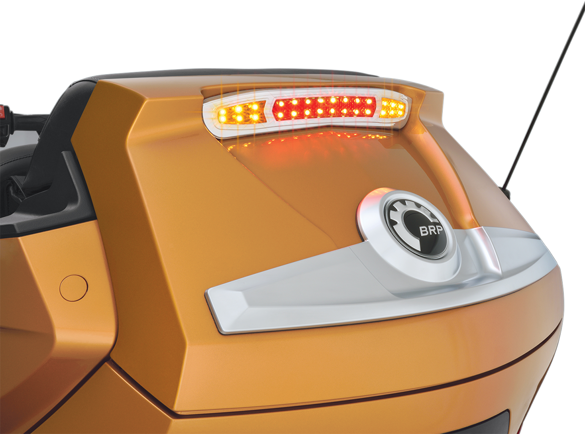 Can-Am SHOW CHROME LED trunk light installed on engine, showcasing sleek chrome finish and bright LED illumination.