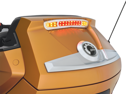 Can-Am SHOW CHROME LED trunk light installed on engine, showcasing sleek chrome finish and bright LED illumination.