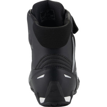 Black Alpinestars Stella Faster-4 motorcycle shoes with textured design and white accents, US 6.5 size, shown from side angle.