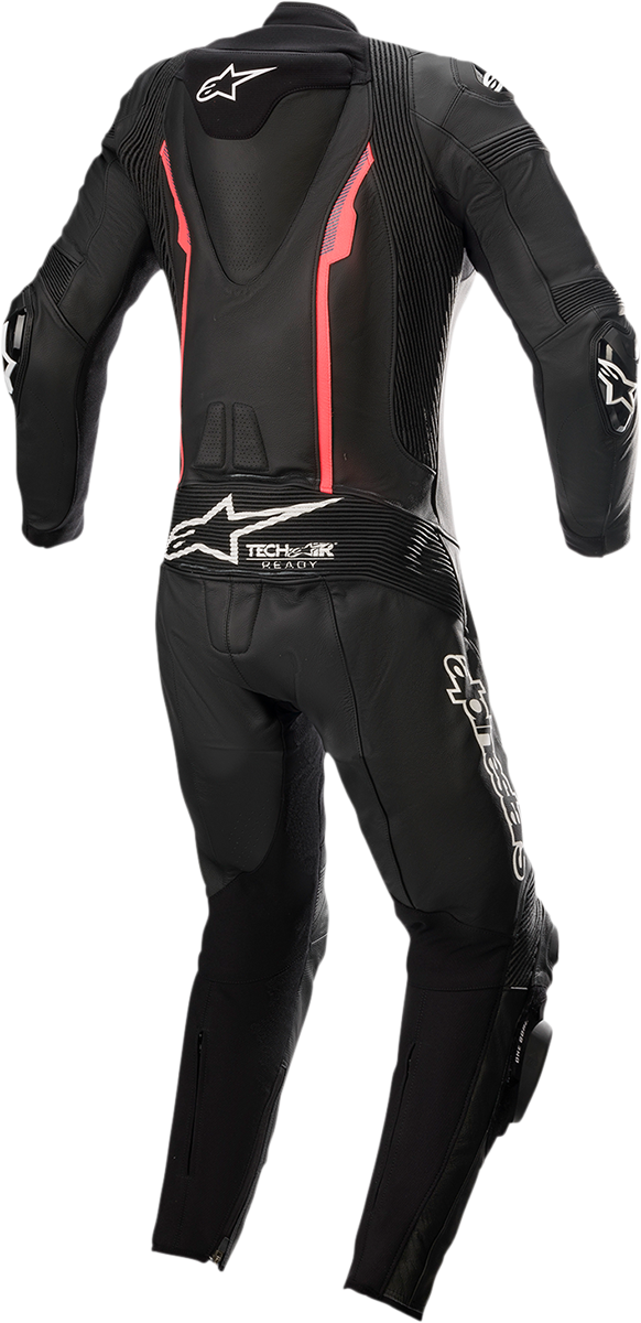 Alpinestars Stella Missile 1-piece motorcycle suit in black and pink, size US 4, EU 40, with protective padding visible.