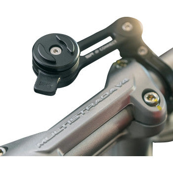 Bill's Exhausts SP CONNECT Module phone mount accessory showing rotation feature and secure attachment for smartphones.