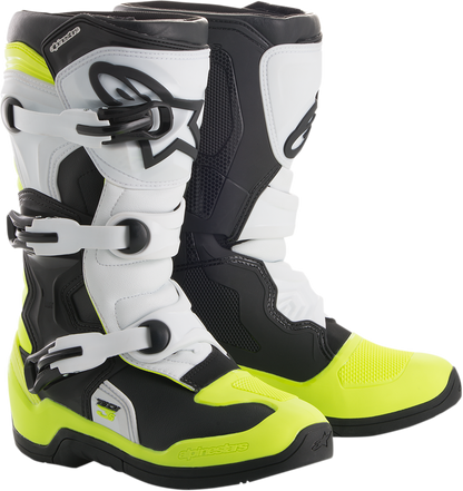 Alpinestars Tech 3S motorcycle boots in black, white, and fluorescent yellow with protective design and branding details.