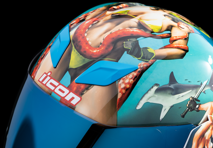 Blue ICON Airflite™ helmet in XS size with Pleasuredome4 design, featuring aerodynamic shape and bold graphics.