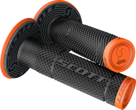 Scott SX II motorcycle grips in orange and black attached to an engine, showcasing durable rubber design with textured grip surfaces.