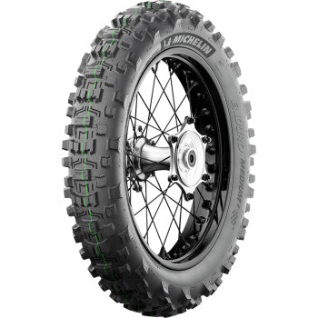 Michelin Enduro Medium 2 rear motorcycle tire, 140/80-18 size, mounted on wheel, featuring tread pattern for off-road riding