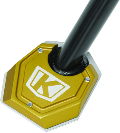 Kuryakyn Lodestar Kickstand Shoe for BMW R1200GS with tire bead breaking tool, enhancing stability and ease of bike maintenance